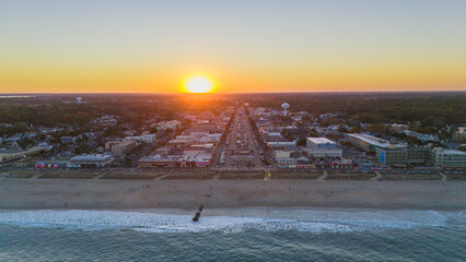 Aerial view of the beach and city at the sunset in Rehoboth Beach, Delaware. Delaware beaches. Delaware coastline. Aerial ocean view.