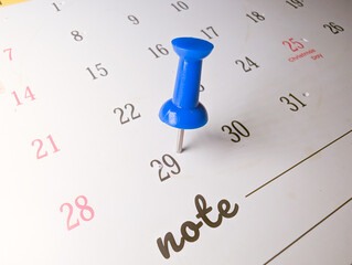29th december date marked with. push pin on calendar