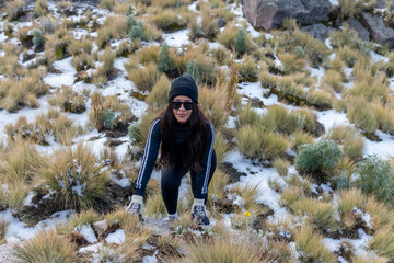 Woman hiking in snow on iztaccihuatl volcano