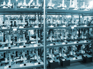 Many 3D printers printing object. 3D printers printing model from molten plastic. 3D printers creating shape from molten plastic flowing out of extruder. New modern 3D Printing additive technologies