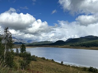 Tranquil water scene, Peaceful pond with trees and mountains