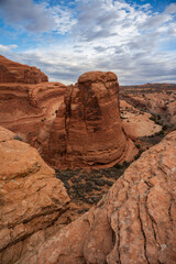 Fototapeta premium This fine art photograph captures the timeless beauty of the sandstone arches of **Arches National Park**, located just outside Moab, one of the most iconic landscapes in the American Southwest. C