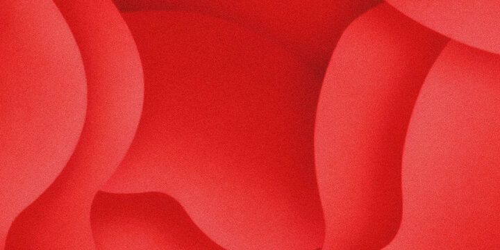 A striking close up of vibrant red abstract forms showcasing smooth curves and dynamic shapes with a blurred effect high quality