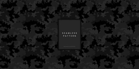 Seamless monochrome camouflage pattern or rugged camo texture with sharp geometric shapes in black and charcoal for heavy duty tactical gear and military equipment surface or denim © gegen