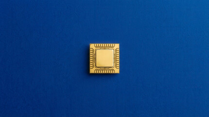 Golden microchip on a vibrant blue background, symbolizing technology and innovation