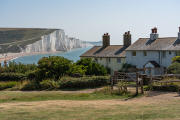 Stunning landscape of the Seven Sisters cliffs and coastguard cottages viewed from Seaford Head, East Sussex, England