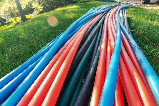 Laying Fiber Optic cables for underground high speed internet communications.