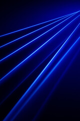 Abstract blue laser beams on dark background