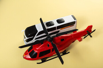 Colorful toys on a yellow background