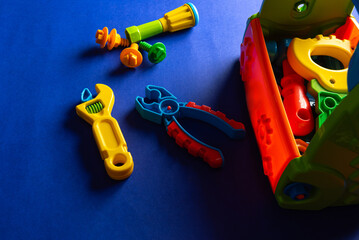 Colorful toys on a blue background