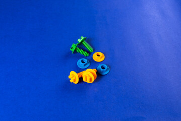 Colorful toys on a blue background