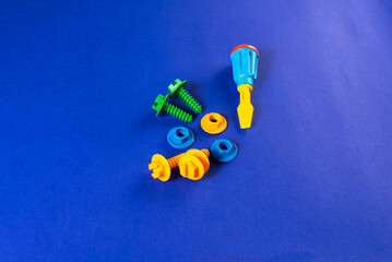 Colorful toys on a blue background