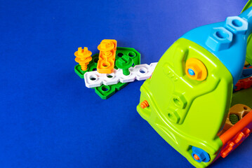 Colorful toys on a blue background