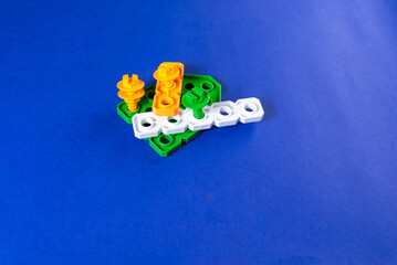 Colorful toys on a blue background