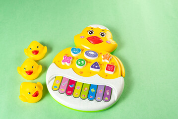 Colorful toys on a green background