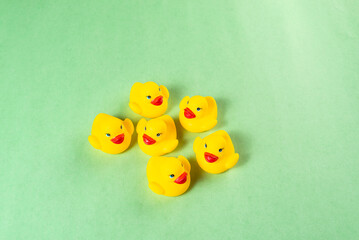 Colorful toys on a green background