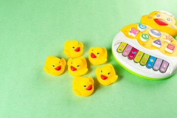 Colorful toys on a green background