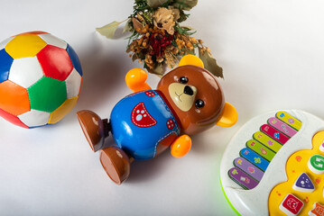 Naklejka premium Colorful toys on a white background