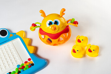 Naklejka premium Colorful toys on a white background