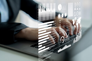 A business professional analyzes data on a laptop, surrounded by digital analytics tools and graphs reflecting insights, trends, and performance metrics for strategic decision-making. Impute