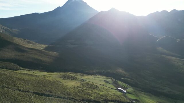 Fly over the Colombian moorland with views towards the Nevado de Tolima volcano near canyons and rock formations