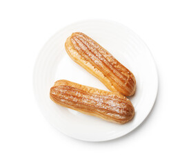 Delicious eclairs with powdered sugar isolated on white, top view