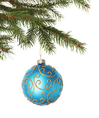 Christmas ball with pattern hanging on fir tree branch isolated on white