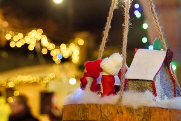 Christmas tree with decorations and lights on background