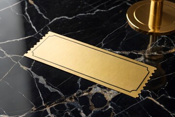 Blank gold ticket on a black marble surface symbolizing luxury, exclusivity and premium access. Elegant minimal image ideal for VIP invitations, branding, memberships and high-end design concepts.