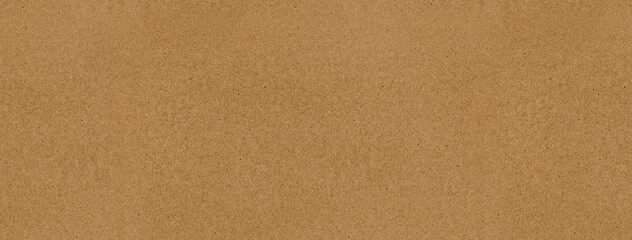 Brown kraft paper sheet - seamless background texture. Recycled cardboard carton packaging banner.