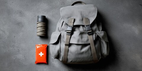 everyday carry essentials, neatly arranged no-logo essentials headlamp, multi-tool, first-aid kit, and energy bar showcased in a styled flat lay