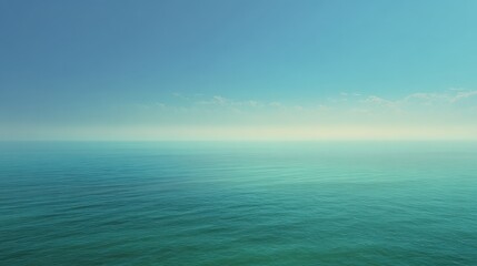 Fototapeta premium Serene ocean view with tranquil turquoise waters and clear blue sky.