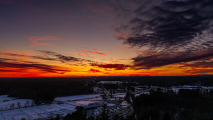 Winter aerial view of a stunning sunset in Durham, New Hampshire