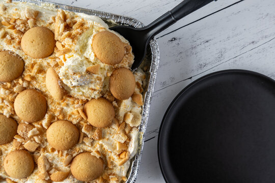 Close up of fresh banana pudding with vanilla wafer cookies on top