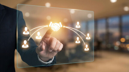 Businessman touching virtu screen with connecting to people icons. This represents global business networking, partnership, and virtual team collaboration