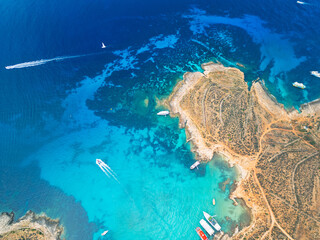 Blue Lagoon on Comino Island, Malta - aerial drone view