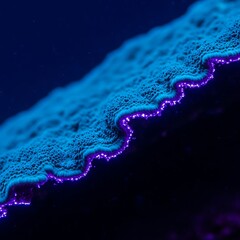 Vibrant Blue Coral with Purple Edges Under Deep Sea Illumination.