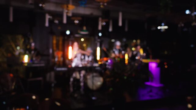 Softly lit jazz performance ambiance, Atmospheric jazz setting with blurry figures and expressive motion