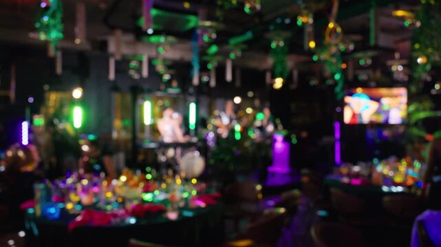 Vivid illumination and smoke at live event, Dynamic beams and audience shadows fill crowded venue