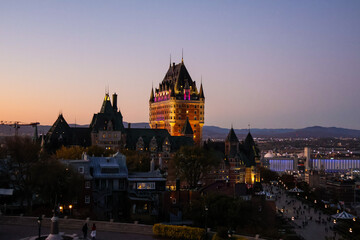 Beautiful Quebec landscape featuring a hotel nestled in nature, blending comfort with scenic...