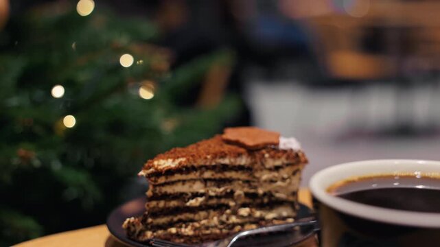 Coffee and cake ambiance captured, Cozy cafe setting featuring steaming drink and distant treats