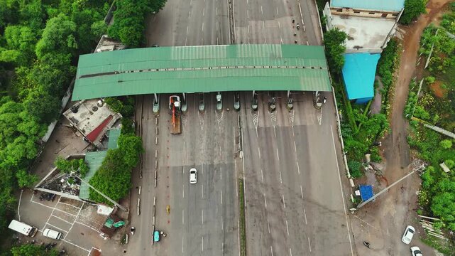 aerial view of highway toll plaza, drone shot of indian toll gate, expressway toll collection point, transport infrastructure on highway stock photo.