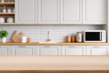 Fototapeta premium Empty wooden kitchen table presenting copy space with a bright, blurred contemporary kitchen interior in the background