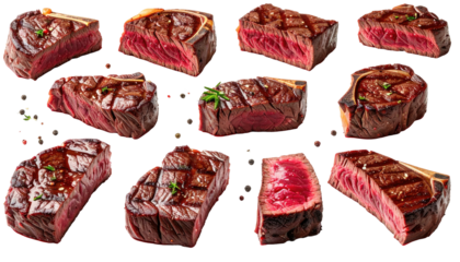 Sliced and grilled beef steaks, perfectly cooked, against black