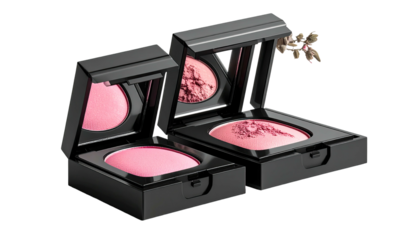 Two open compacts of pink blush, one reflecting in a mirror