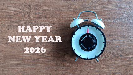 table clock with a new year's greeting card