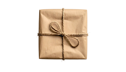 A brown paper package tied with twine, viewed from above, on black