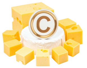 Assorted cheeses surround a golden disc with a letter "C