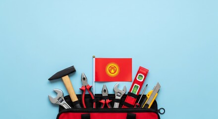 Kyrgyzstan toolkit with flag and various tools for construction