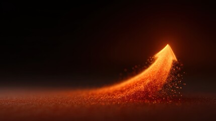 Dynamic orange arrow made of glowing particles representing upward movement, growth, or progress in a vibrant and abstract design for visual inspiration